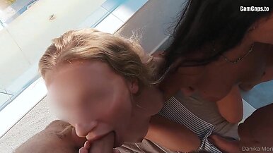 Two hot bitches suck lovers' dicks on the balcony